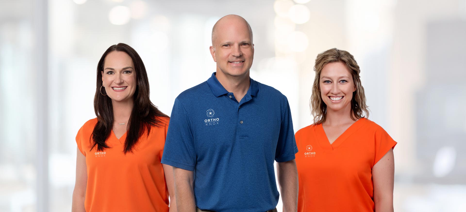 This is a group image of the OrthoKnox physical therapy team.