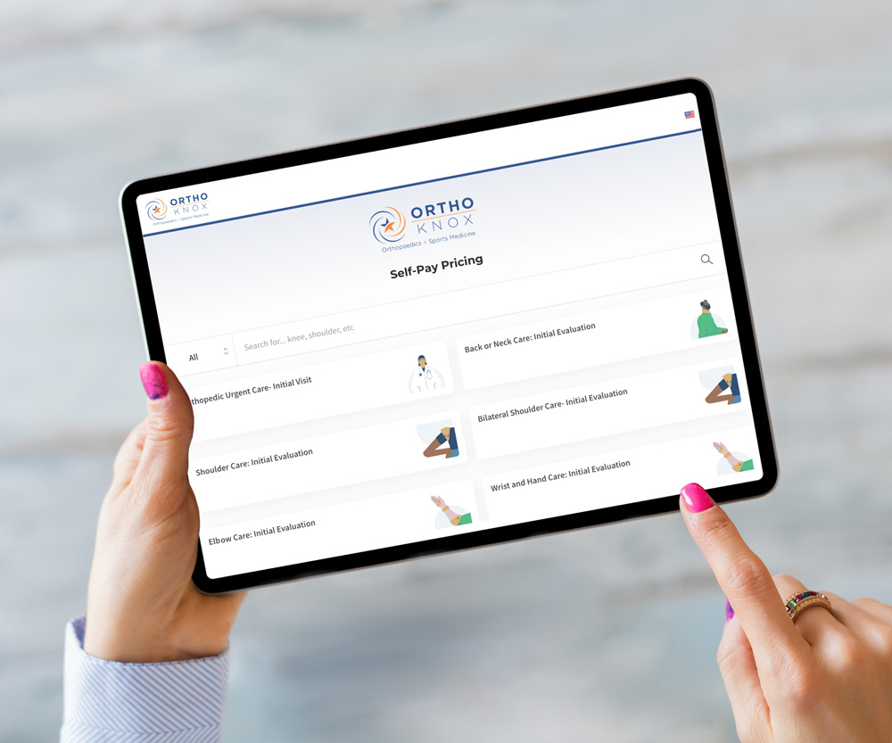 This is an image of a person's hands holding a smart tablet that is displaying OrthoKnox self-pay pricing options.