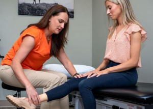 Patient receiving in-house physical therapy for knee pain at OrthoKnox in Knoxville, TN.